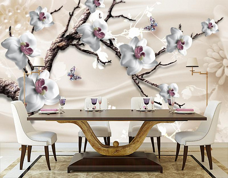 Белая орхидея на ветке в интерьере кухни с большим столом