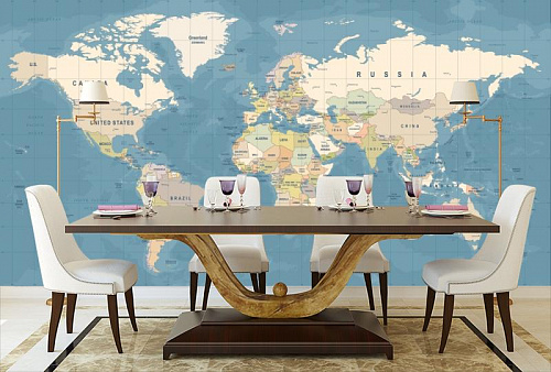 Карта мира на голубом фоне в интерьере кухни с большим столом