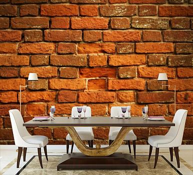 Кирпичная стена с изъяном в интерьере кухни с большим столом