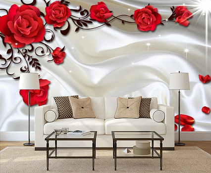 Алые розы на белом шелке в интерьере гостиной с диваном