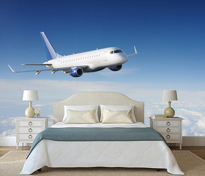 Самолет над облаками в интерьере спальни
