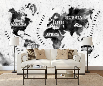 Черно-белая карта мира в интерьере гостиной с диваном