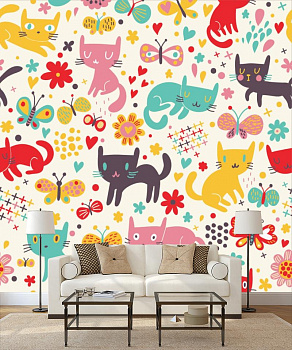 Разноцветные кошки в интерьере гостиной с диваном