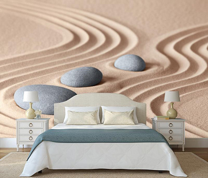 Серые камни на песке в интерьере спальни