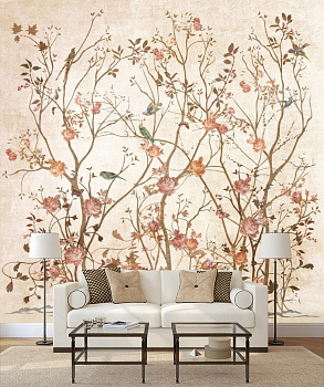 Птицы на цветущих деревьях в интерьере гостиной с диваном