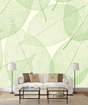 Прозрачные зеленые листья в интерьере гостиной с диваном