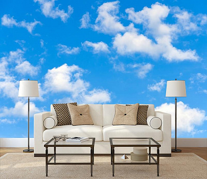 Голубое небо с облаками в интерьере гостиной с диваном