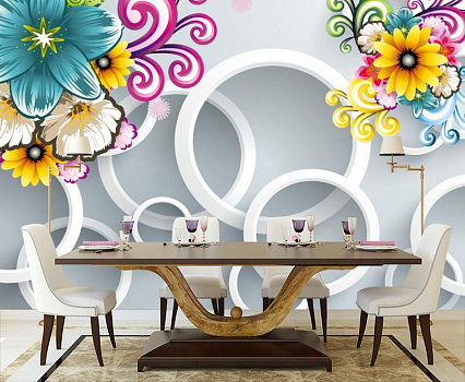 Белые кольца с яркими цветами в интерьере кухни с большим столом