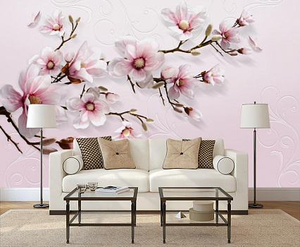 Цветущая ветка дерева в интерьере гостиной с диваном