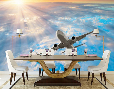 Самолет в голубой выси в интерьере кухни с большим столом