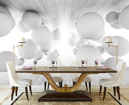 Парящие белые шары в интерьере кухни с большим столом