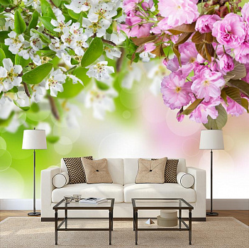 Вишня в цвету в интерьере гостиной с диваном