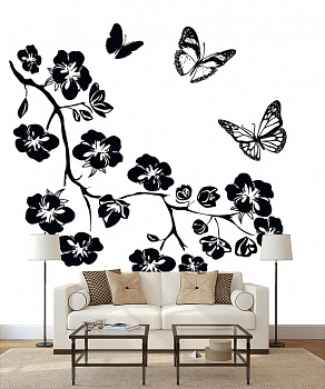 Бабочки и цветы в интерьере гостиной с диваном