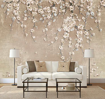 Ветка цветущего дерева в интерьере гостиной с диваном