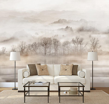 Лес в тумане на фоне гор в интерьере гостиной с диваном