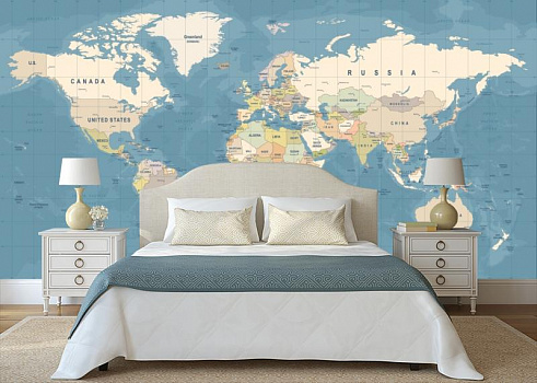 Карта мира на голубом фоне в интерьере спальни
