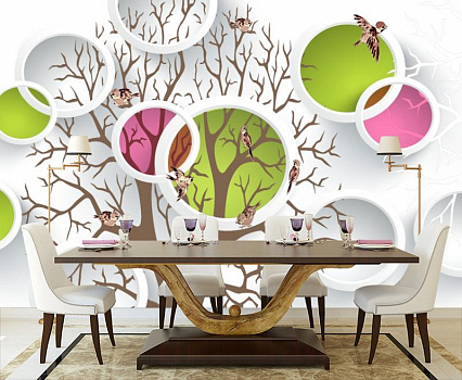 Дерево в разноцветных кругах в интерьере кухни с большим столом