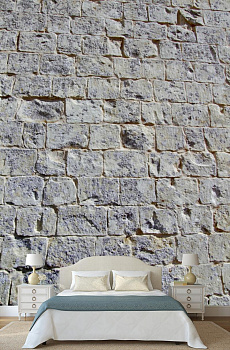 Каменная стена серо-синяя в интерьере спальни