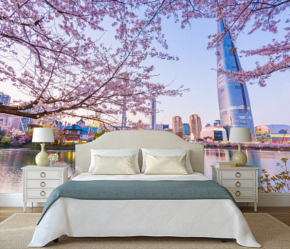 Цветущая сакура над городом в интерьере спальни