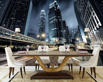 Ночной мегаполис в интерьере кухни с большим столом