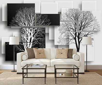Деревья на черном и белом фоне в интерьере гостиной с диваном