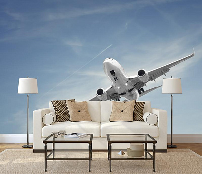 Самолет в небе в интерьере гостиной с диваном