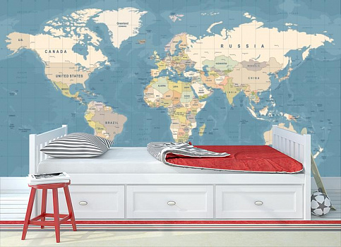 Карта мира на голубом фоне в интерьере детской комнаты мальчика