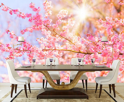 Цветущие деревья весной в интерьере кухни с большим столом