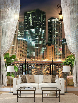 Балкон с видом на ночной город в интерьере гостиной с диваном